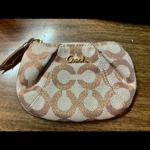Coach coin purse. Rose gold fabric